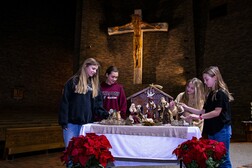 Student in prayer to Jesus Christ