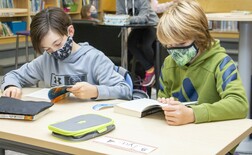 Students reading their books